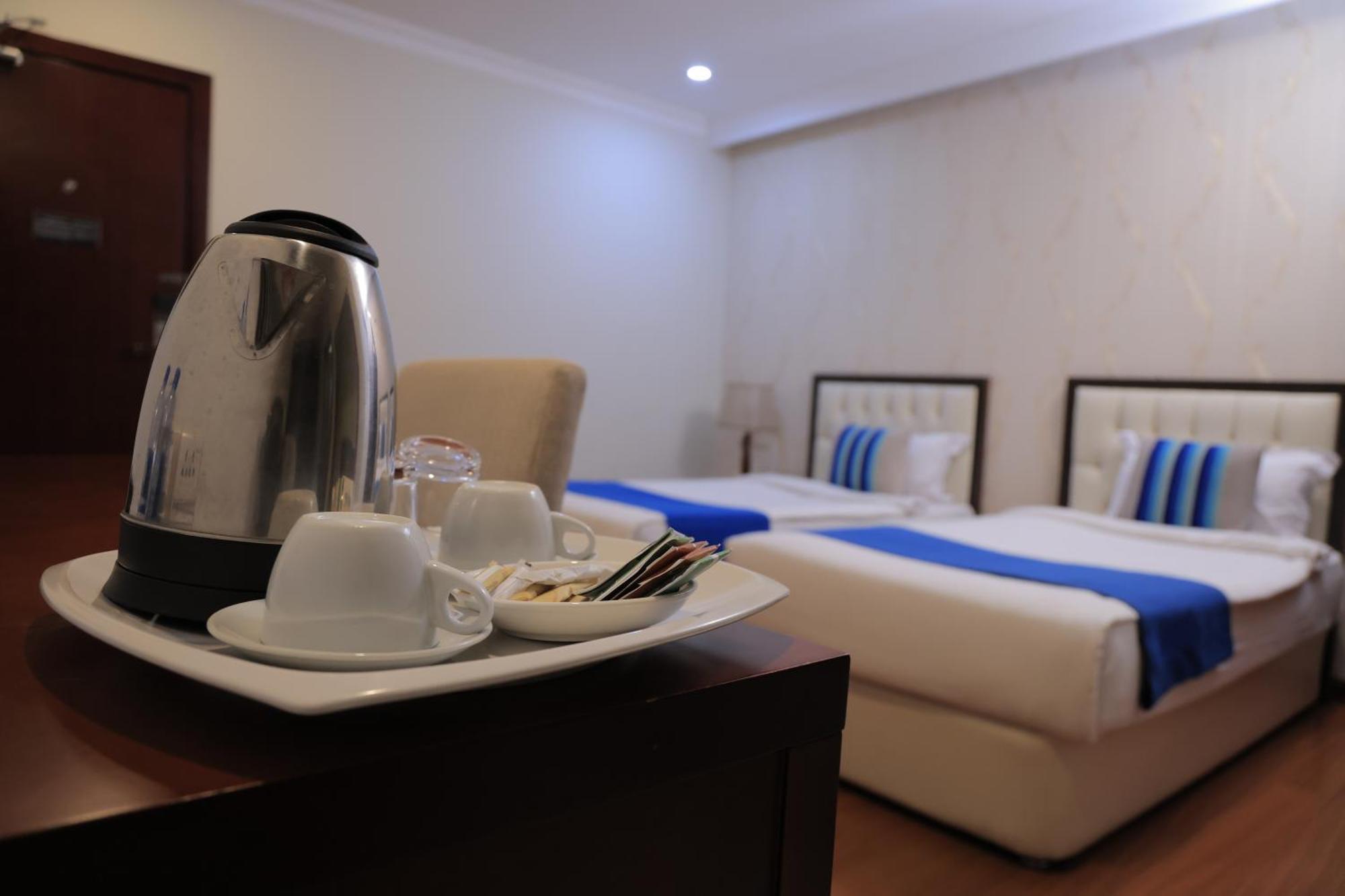 Tolip Olympia Hotel Addis-Abeba Chambre photo